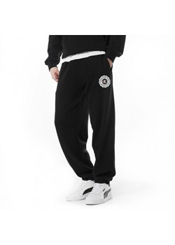 Męskie spodnie dresowe Champion Rochester Elastic Cuff Pants - czarne ze sklepu Sportstylestory.com w kategorii Spodnie męskie - zdjęcie 170279267