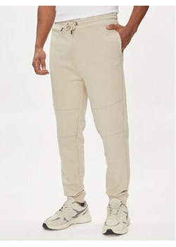 Boss Spodnie dresowe Se_brid 50513379 Beżowy Regular Fit ze sklepu MODIVO w kategorii Spodnie męskie - zdjęcie 170326819