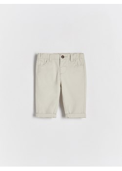 Reserved - Bawełniane spodnie chino - beżowy ze sklepu Reserved w kategorii Spodnie i półśpiochy - zdjęcie 170338847