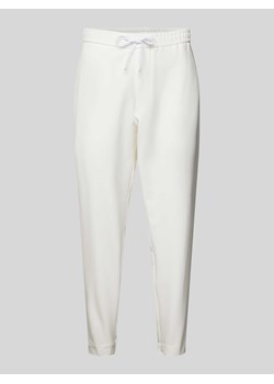 Spodnie dresowe z elastycznym pasem model ‘Flex’ ze sklepu Peek&Cloppenburg  w kategorii Spodnie damskie - zdjęcie 170342398