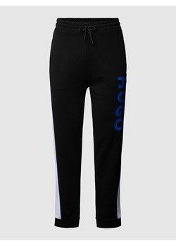 NOWOŚĆ w P&C*: Spodnie dresowe o kroju regular fit model ‘Narlos’ ze sklepu Peek&Cloppenburg  w kategorii Spodnie męskie - zdjęcie 170342735
