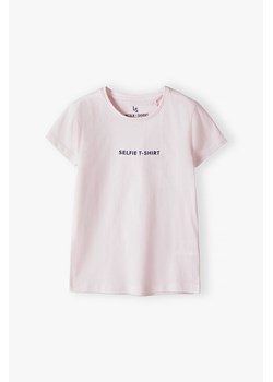 Różowy t-shirt bawełniany dla dziewczynki ze sklepu 5.10.15 w kategorii Bluzki dziewczęce - zdjęcie 170405287