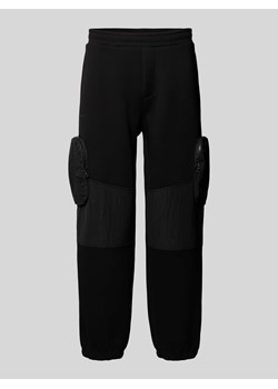 Spodnie dresowe o luźnym kroju z kieszeniami cargo model ‘PANTALONI’ ze sklepu Peek&Cloppenburg  w kategorii Spodnie męskie - zdjęcie 170408439