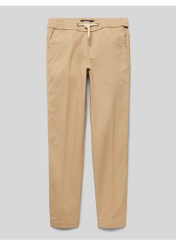 Spodnie o kroju regular fit z detalem z logo model ‘EPIC JOGGER’ ze sklepu Peek&Cloppenburg  w kategorii Spodnie chłopięce - zdjęcie 170413777