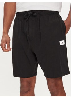 Calvin Klein Underwear Szorty piżamowe 000NM2610E Czarny Regular Fit ze sklepu MODIVO w kategorii Piżamy męskie - zdjęcie 170425219