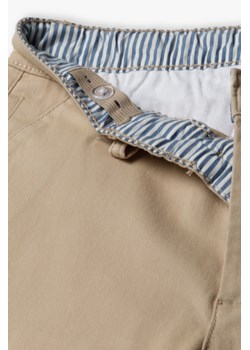 Beżowe spodnie dla chłopca - chinos - Lincoln&Sharks ze sklepu 5.10.15 w kategorii Spodnie chłopięce - zdjęcie 170431079