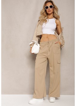 Beżowe Szerokie Spodnie z Gumką w Talii i Kieszeniami z Klapkami Cargo Nukeria ze sklepu Renee odzież w kategorii Spodnie damskie - zdjęcie 170466025