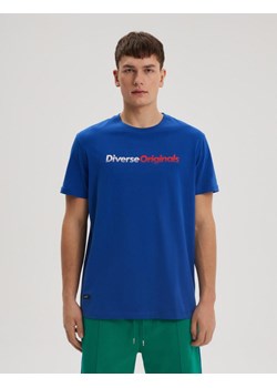 Koszulka ORGL LOGO TEE Niebieski M ze sklepu Diverse w kategorii T-shirty męskie - zdjęcie 170474869
