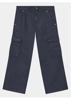 Guess Spodnie materiałowe J4RB14 WEHD0 Granatowy Relaxed Fit ze sklepu MODIVO w kategorii Spodnie chłopięce - zdjęcie 170477005