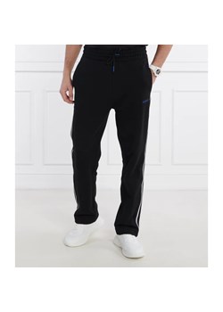 Hugo Blue Spodnie dresowe Nasillas | Loose fit ze sklepu Gomez Fashion Store w kategorii Spodnie męskie - zdjęcie 170493315