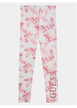 Guess Legginsy J4RB06 J1313 Różowy Slim Fit ze sklepu MODIVO w kategorii Spodnie dziewczęce - zdjęcie 170493577