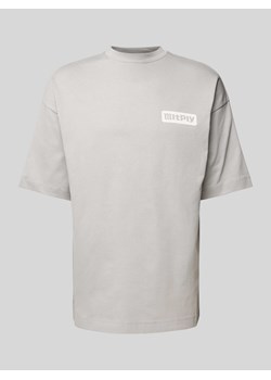 T-shirt o kroju oversized z nadrukiem z logo ze sklepu Peek&Cloppenburg  w kategorii T-shirty męskie - zdjęcie 170524937
