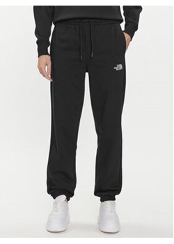 The North Face Spodnie dresowe Essential NF0A7ZJF Czarny Relaxed Fit ze sklepu MODIVO w kategorii Spodnie damskie - zdjęcie 170525706