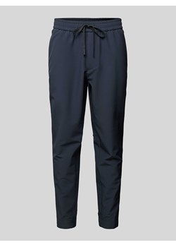Spodnie dresowe z elastycznym pasem model ‘Flex’ ze sklepu Peek&Cloppenburg  w kategorii Spodnie męskie - zdjęcie 170530485