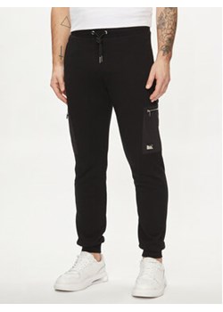 KARL LAGERFELD Spodnie dresowe 705042 542900 Czarny Regular Fit ze sklepu MODIVO w kategorii Spodnie męskie - zdjęcie 170554238