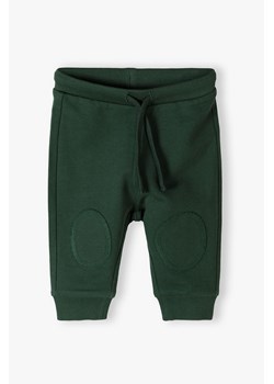 Zielone bawełniane spodnie dresowe niemowlęce - 5.10.15. ze sklepu 5.10.15 w kategorii Spodnie i półśpiochy - zdjęcie 170556157
