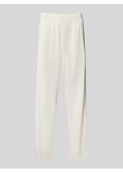 Spodnie dresowe o kroju regular fit z elastycznym pasem model ‘FIREBIRD’ ze sklepu Peek&Cloppenburg  w kategorii Spodnie męskie - zdjęcie 170574206