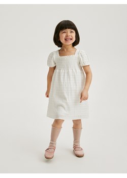 Reserved - Bawełniana sukienka - złamana biel ze sklepu Reserved w kategorii Sukienki niemowlęce - zdjęcie 170576885