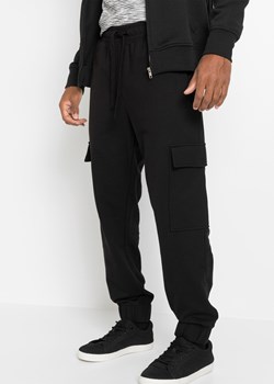 Spodnie sportowe bojówki Loose Fit ze sklepu bonprix w kategorii Spodnie męskie - zdjęcie 170610559