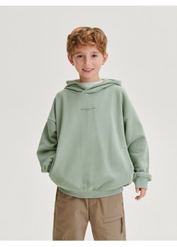 Reserved - Bluza oversize z kapturem - oliwkowy ze sklepu Reserved w kategorii Bluzy chłopięce - zdjęcie 170655256