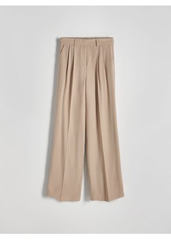 Reserved - Spodnie z wiskozy - beżowy ze sklepu Reserved w kategorii Spodnie damskie - zdjęcie 170655825
