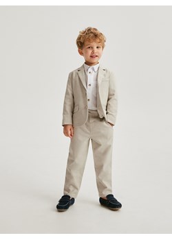 Reserved - Eleganckie spodnie regular fit - beżowy ze sklepu Reserved w kategorii Spodnie chłopięce - zdjęcie 170687627