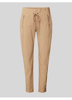 Spodnie o kroju tapered fit z kieszeniami zapinanymi na zamek błyskawiczny model ‘EASY ACTIVE’ ze sklepu Peek&Cloppenburg  w kategorii Spodnie damskie - zdjęcie 170729018