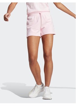 adidas Szorty sportowe Essentials Linear IC6877 Różowy Slim Fit ze sklepu MODIVO w kategorii Szorty - zdjęcie 170744877