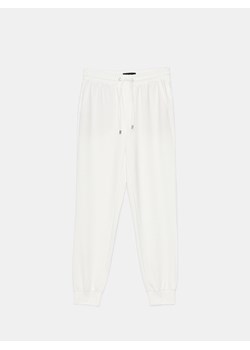 Mohito - Białe spodnie dresowe - kremowy ze sklepu Mohito w kategorii Spodnie damskie - zdjęcie 170779435