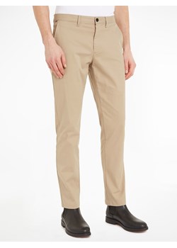 Tommy Hilfiger Spodnie chino w kolorze beżowym ze sklepu Limango Polska w kategorii Spodnie męskie - zdjęcie 170784036