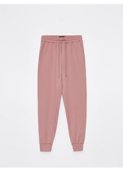 Mohito - Spodnie dresowe z wiskozą - różowy ze sklepu Mohito w kategorii Spodnie damskie - zdjęcie 170806505
