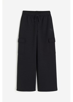 H & M - Sportowe spodnie cargo - Czarny ze sklepu H&M w kategorii Spodnie dziewczęce - zdjęcie 170811575