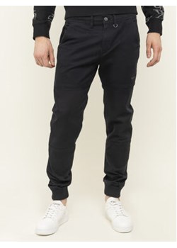 Calvin Klein Jeans Spodnie materiałowe J30J314207 Czarny Regular Fit ze sklepu MODIVO w kategorii Jeansy męskie - zdjęcie 170848788