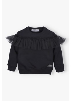 Czarna bluza dla dziewczynki z tiulową falbanką ze sklepu 5.10.15 w kategorii Bluzy dziewczęce - zdjęcie 170850725