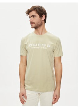 Guess T-Shirt M4GI61 J1314 Beżowy Slim Fit ze sklepu MODIVO w kategorii T-shirty męskie - zdjęcie 170878347