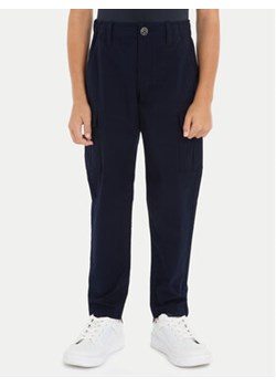 Tommy Hilfiger Spodnie materiałowe KB0KB08837 Granatowy Regular Fit ze sklepu MODIVO w kategorii Spodnie chłopięce - zdjęcie 170878468
