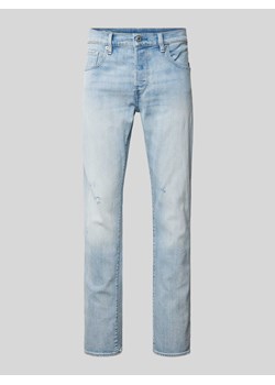 Jeansy o kroju slim fit z efektem znoszenia model ‘3301’ ze sklepu Peek&Cloppenburg  w kategorii Jeansy męskie - zdjęcie 170894729