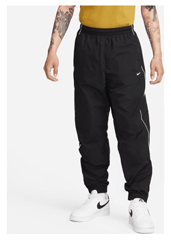 Męskie spodnie dresowe Nike Solo Swoosh - Czerń ze sklepu Nike poland w kategorii Spodnie męskie - zdjęcie 170914187