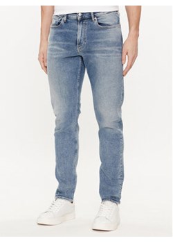 Calvin Klein Jeans Jeansy J30J324844 Niebieski Slim Fit ze sklepu MODIVO w kategorii Jeansy męskie - zdjęcie 170919185
