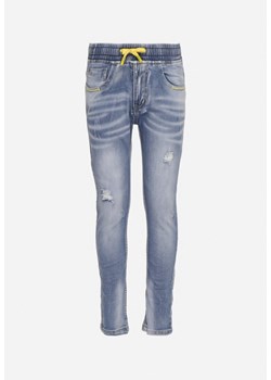 Jasnoniebieskie Jeansy z Przetarciami i Dziurami Wykończone Gumką w Pasie Salicaria ze sklepu Born2be Odzież w kategorii Spodnie chłopięce - zdjęcie 170924326