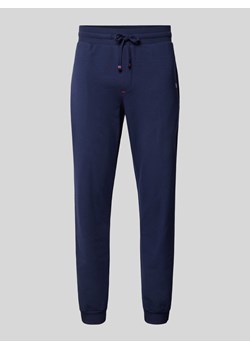 Spodnie dresowe w jednolitym kolorze ze sklepu Peek&Cloppenburg  w kategorii Spodnie męskie - zdjęcie 170927479