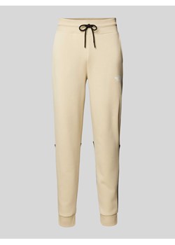 Spodnie dresowe o kroju regular fit z nadrukiem z logo model ‘ICONS’ ze sklepu Peek&Cloppenburg  w kategorii Spodnie męskie - zdjęcie 170946827
