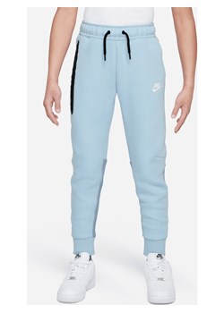 Spodnie dla dużych dzieci (chłopców) Nike Sportswear Tech Fleece - Niebieski ze sklepu Nike poland w kategorii Spodnie chłopięce - zdjęcie 170947616
