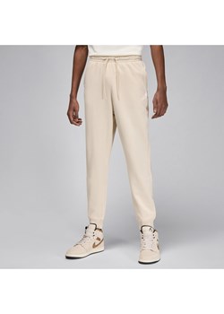 Męskie spodnie z dzianiny pętelkowej Jordan Essentials - Brązowy ze sklepu Nike poland w kategorii Spodnie męskie - zdjęcie 170947639