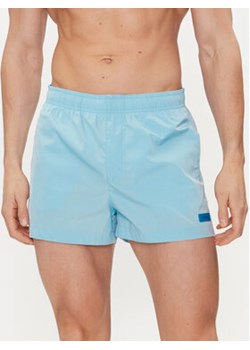 Calvin Klein Swimwear Szorty kąpielowe KM0KM00941 Niebieski Regular Fit ze sklepu MODIVO w kategorii Kąpielówki - zdjęcie 170970908