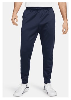 Męskie zwężane spodnie do fitnessu Therma-FIT Nike Therma - Niebieski ze sklepu Nike poland w kategorii Spodnie męskie - zdjęcie 170993395