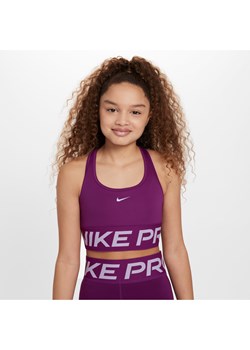 Dziewczęcy stanik sportowy Nike Pro Swoosh - Fiolet ze sklepu Nike poland w kategorii Staniki dla dziewczynki - zdjęcie 170993445