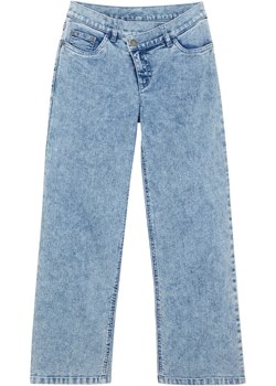 Szerokie dżinsy dziewczęce z ukośnym paskiem ze sklepu bonprix w kategorii Spodnie dziewczęce - zdjęcie 170998976