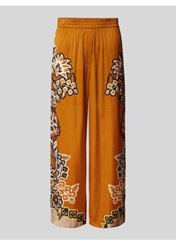 Spodnie materiałowe z szerokimi nogawkami i kwiatowym nadrukiem ze sklepu Peek&Cloppenburg  w kategorii Spodnie damskie - zdjęcie 171154089