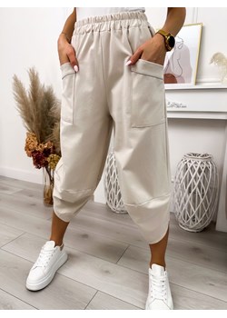 Beżowe Spodnie ze sklepu ModnaKiecka.pl w kategorii Spodnie damskie - zdjęcie 171171506